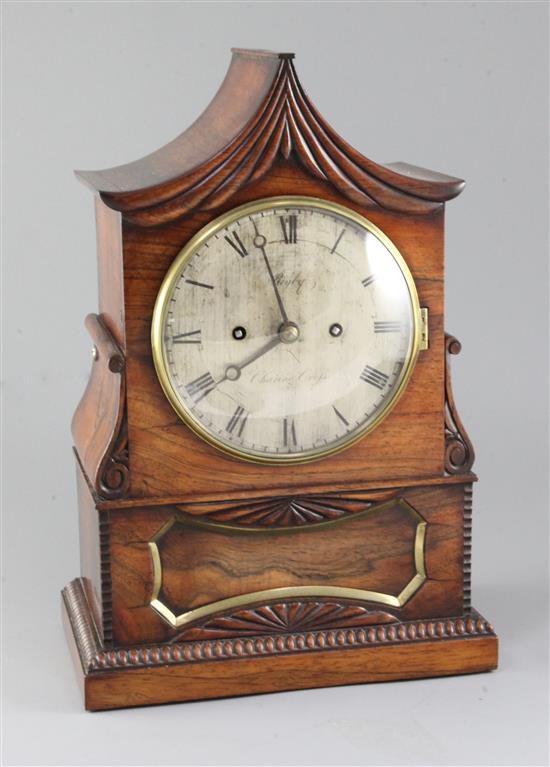 Rigby of Charing Cross. A William IV brass inset rosewood bracket clock, height 15in.